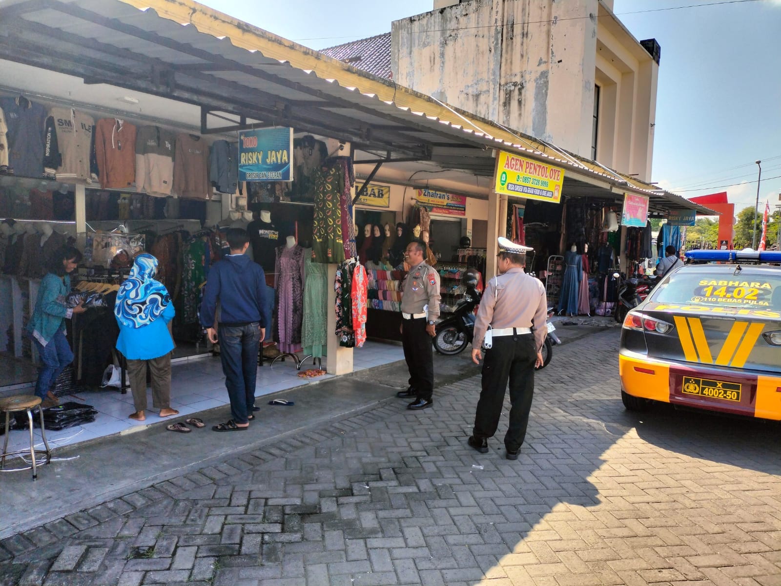 Patroli Harkamtibmas Polsek Nganjuk Kota Berikan Imbauan Kamtibmas di Pasar