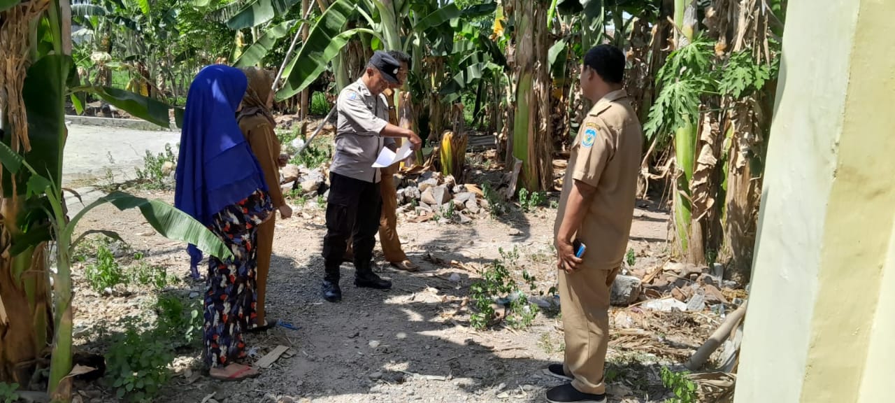 Bhabinkamtibmas Polsek Nganjuk Kota Selesaikan Perselisihan Batas Tanah Antar Warga