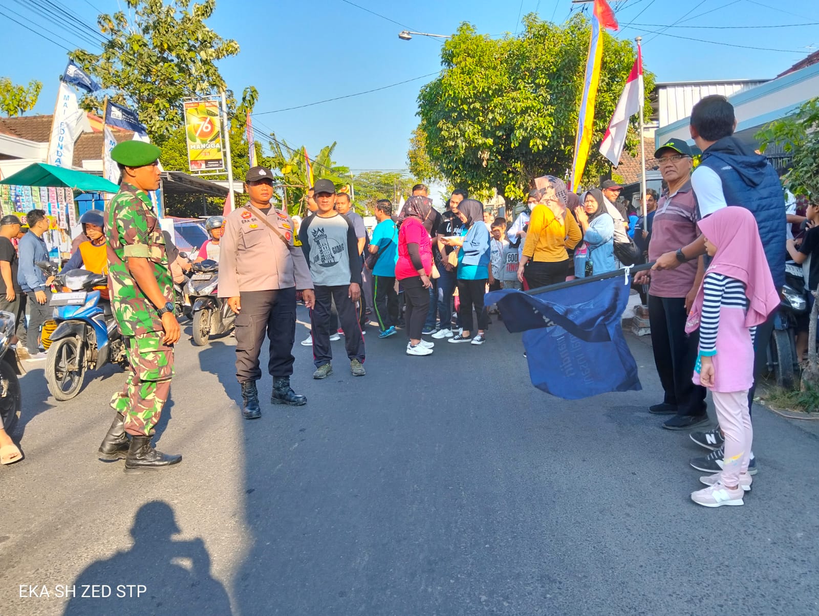 Polsek Warujayeng Amankan Kegiatan Jalan Sehat MAI Foundation Kec. Tanjunganom