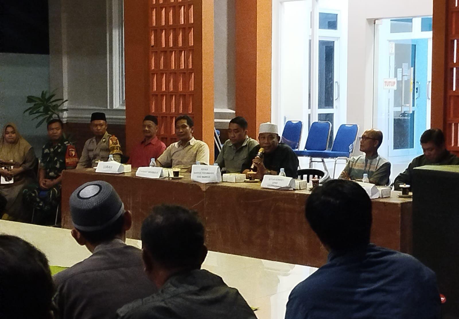 Bhabinkamtibmas Polsek Nganjuk Kota Kelurahan Ploso Hadiri Sosialisasi Pengurangan Kuota PTSL 2025