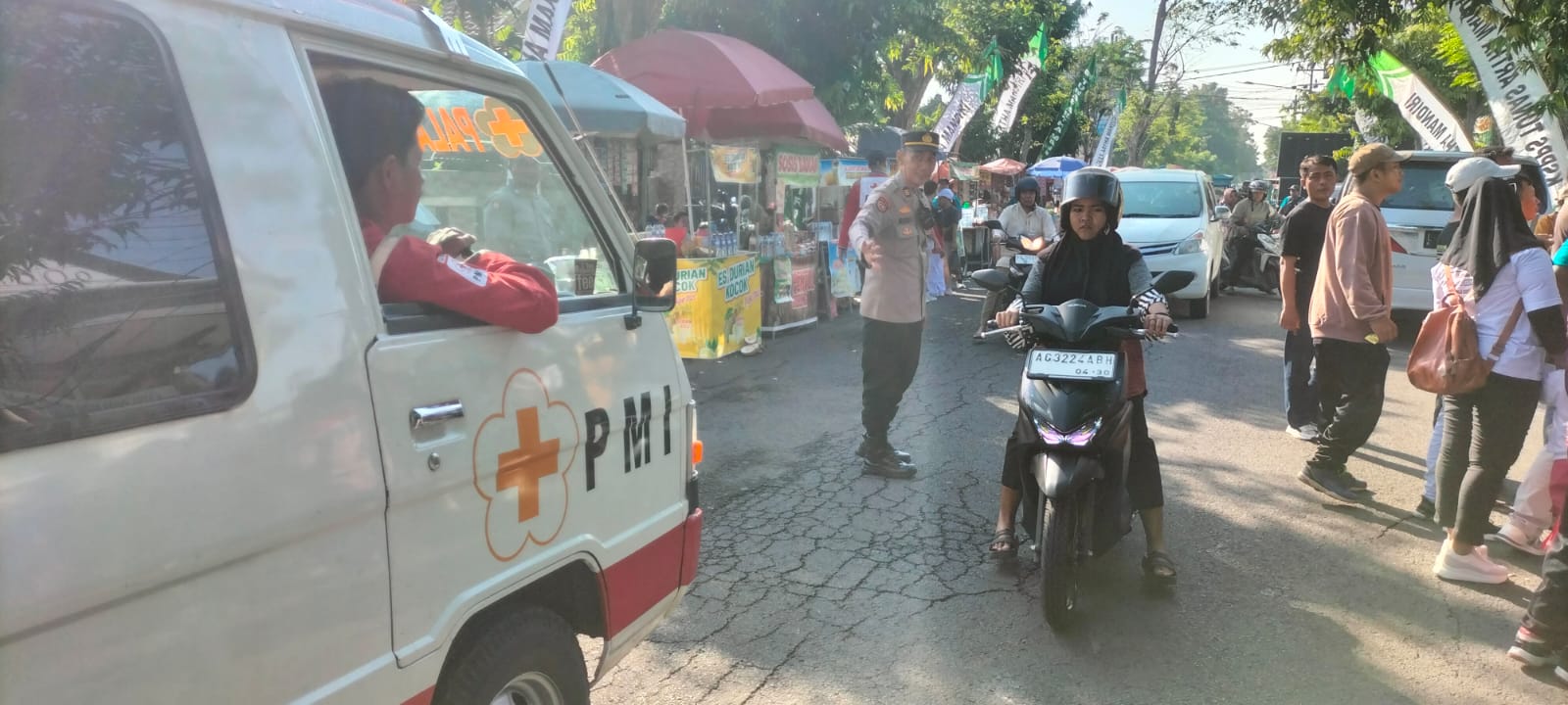 Polsek Nganjuk Kota Amankan Kegiatan Jalan Sehat dan Senam Bersama HUT ke-50 PT. TAM Syariah Nganjuk