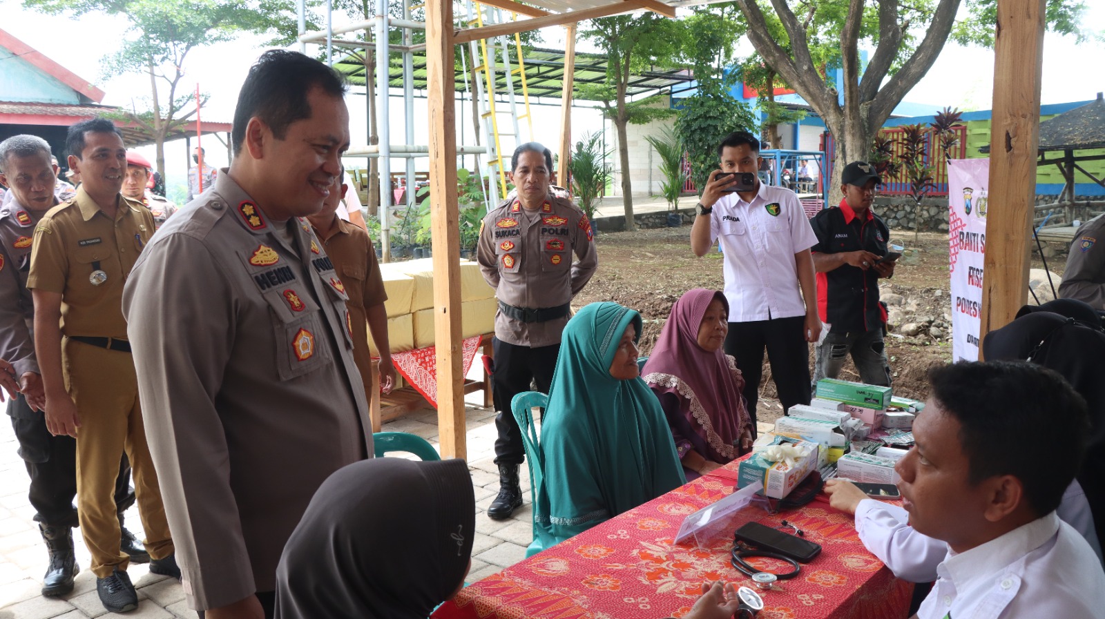 Reserse Presisi Hadir untuk Warga, Polres Nganjuk Gelar Bansos dan Bakkes di Wisata Lumban Pinggir Kali