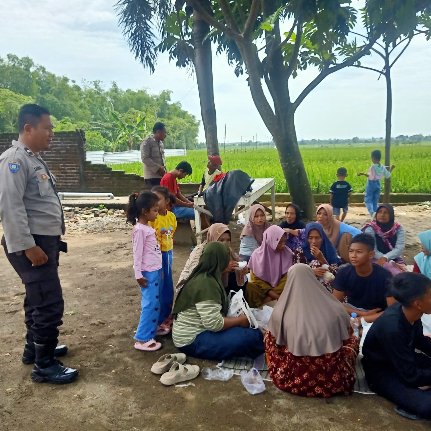 Bhabinkamtibmas Polsek Nganjuk Kota Hadiri Tasyakuran Lingkungan Sambut Ramadhan 1447 H