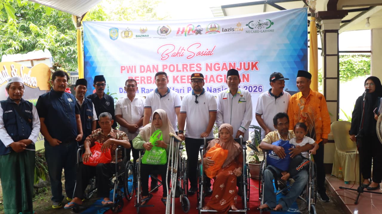 Polres Nganjuk dan PWI Satukan Langkah, Salurkan Kursi Roda dan Sembako Peringati HPN 2026